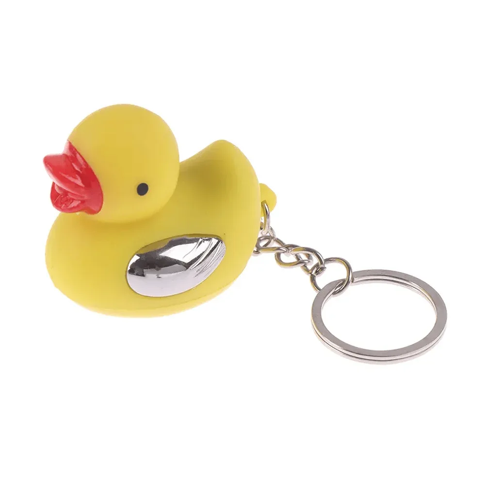 1pza Llavero de patito con argolla de metal, luz led y toques / cd-014 / y-d490